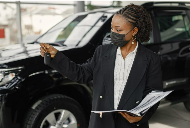 Avis inspecting their rental car after your return  